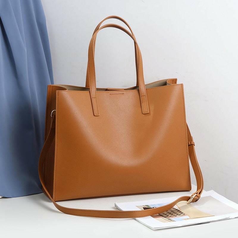 Classic Leather Handbag with Timeless Design and Spacious Interior Camel