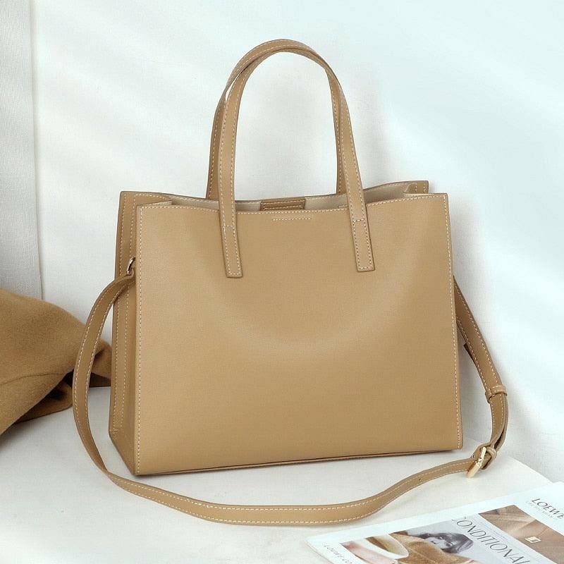 Classic Leather Handbag with Timeless Design and Spacious Interior Tan